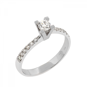 Λευκόχρυσο μονόπετρο δαχτυλίδι τετράδοντο με διαμάντι 0.21ct σε 18 καράτια. RD20166