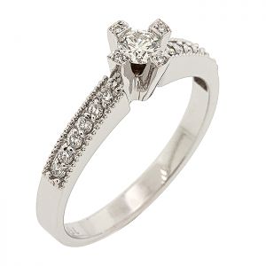 Λευκόχρυσο 18K μονόπετρο δαχτυλίδι με διαμάντι 0.18ct και πλαϊνά διαμάντια. RD02509