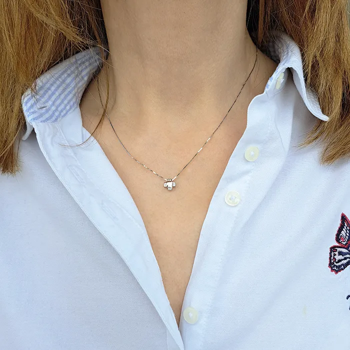 Λευκόχρυσος σταυρός με μπριγιάν 0.03ct και αλυσίδα 18 καράτια. CR18439