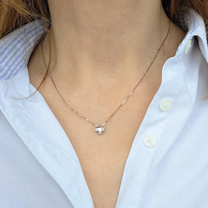 Λευκόχρυσος σταυρός με μπριγιάν 0.03ct και αλυσίδα 18 καράτια. CR18439