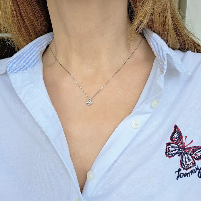 Λευκόχρυσος σταυρός με μπριγιάν 0.08ct και αλυσίδα 18 καράτια. CR18465