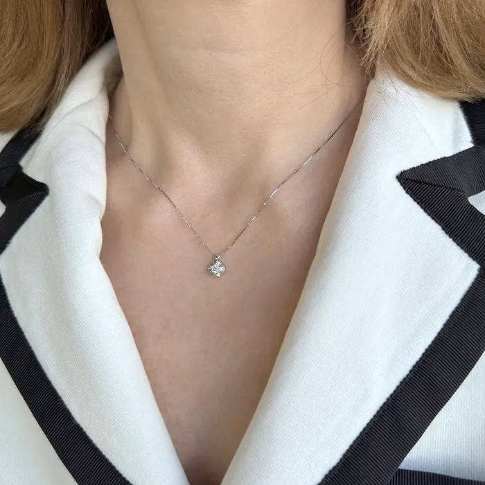 Λευκόχρυσο μενταγιόν με διαμάντι 0.17ct και αλυσίδα 18 καράτια. MD20133