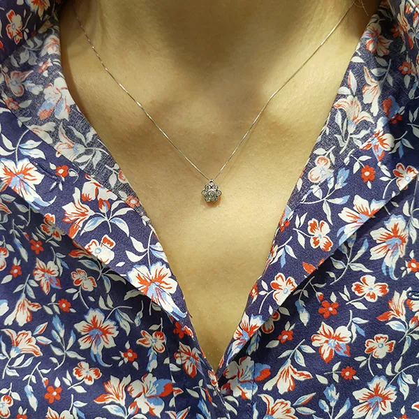 Λευκόχρυσο μενταγιόν με μπριγιάν 0.20ct και αλυσίδα 18Κ. MD12219