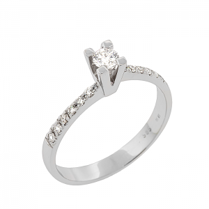 Λευκόχρυσο μονόπετρο δαχτυλίδι με διαμάντι 0.12ct σε 18 καράτια. RD20167